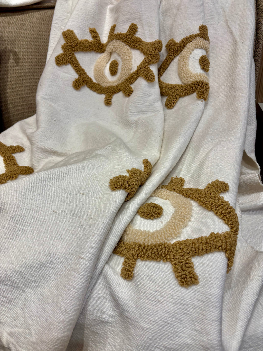 Plaid marocain pompons - brodé œil