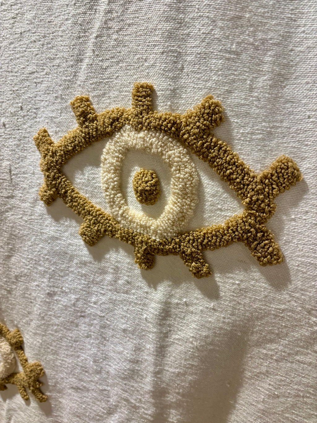 Plaid marocain pompons - brodé œil